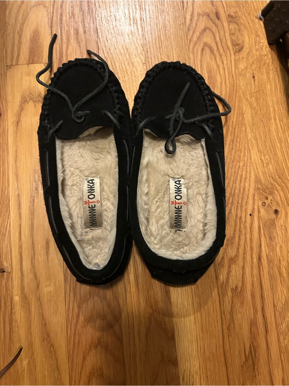 Minnetonka Black Suede Moccasin Slippers with Cream Faux-Fur Lining